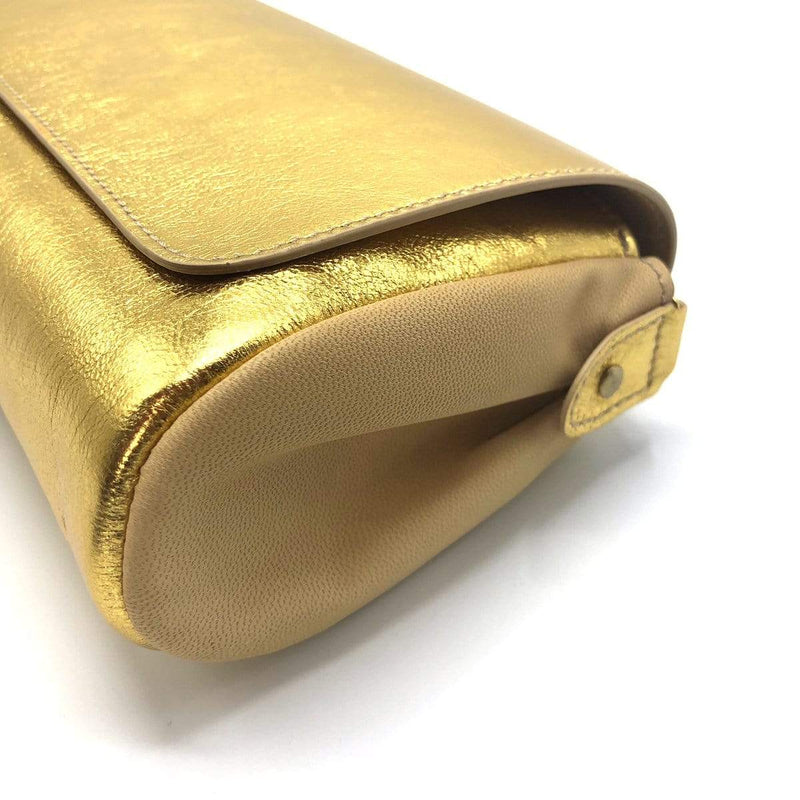 “Promenade”，金色，手工制作的小袋